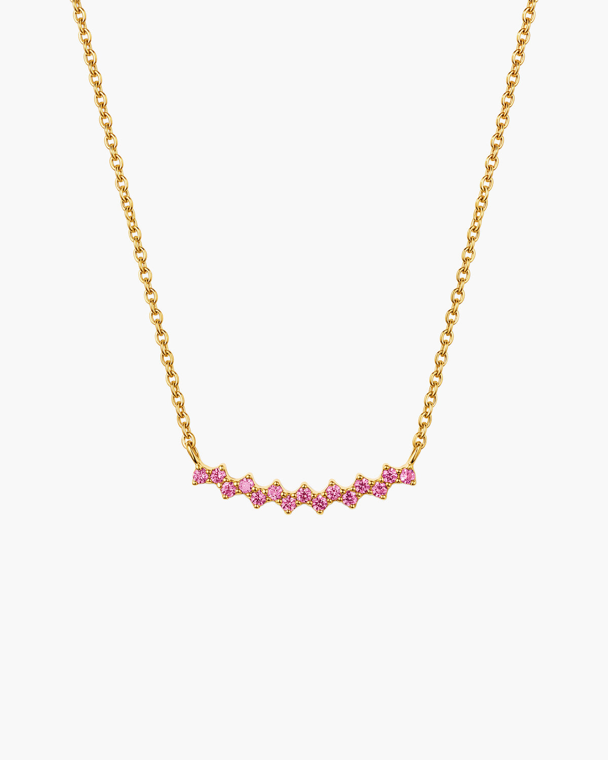 Collar Aria en rosa, barra curva en tono dorado con una fila de piedras redondas rosas, en cadena de eslabones