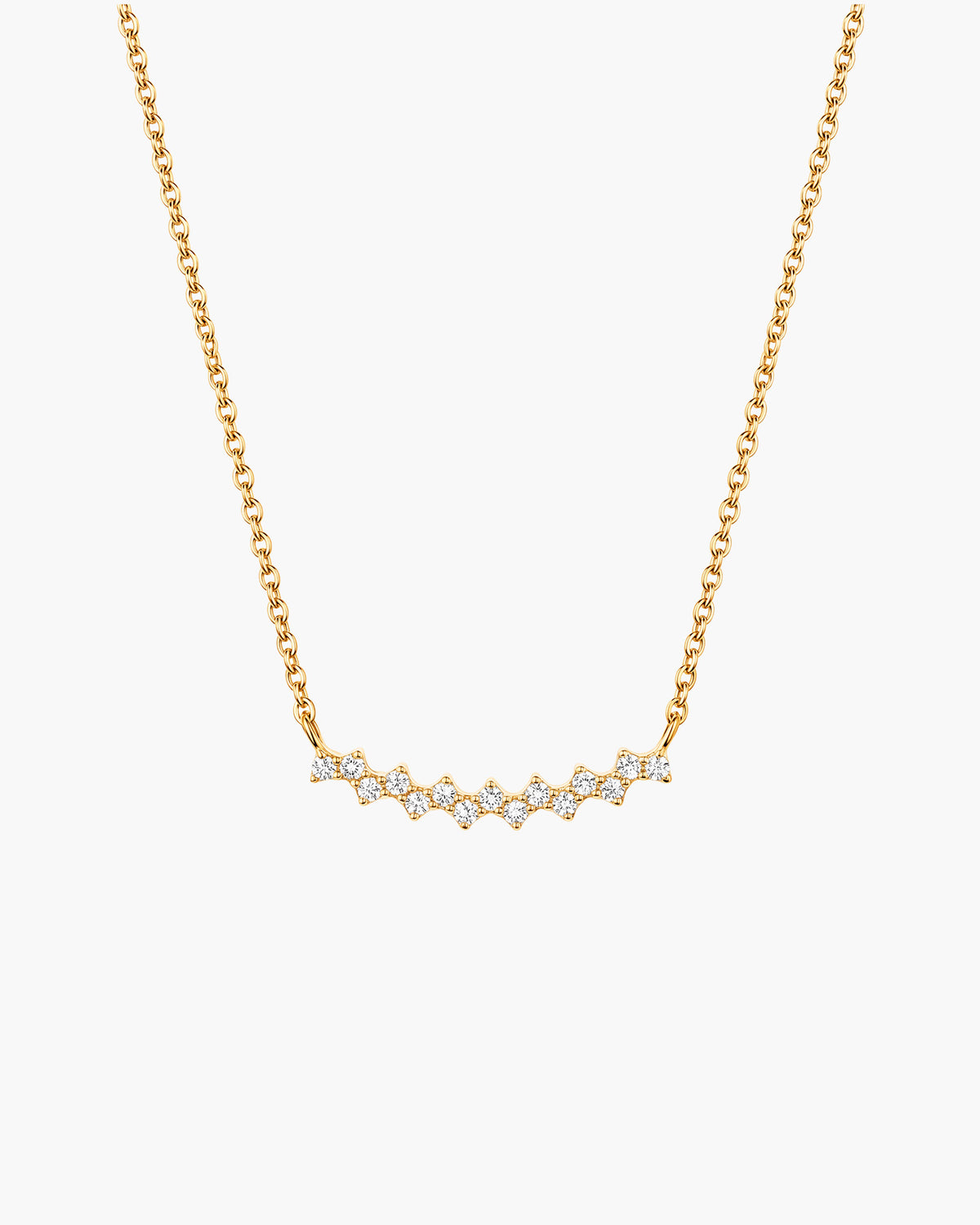 Collar Aria en blanco, barra curva en tono dorado con una fila de piedras redondas transparentes, en cadena de eslabones